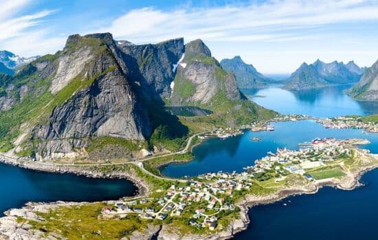 The mountains and houses on the coast of the Lofoten Islands in Norway