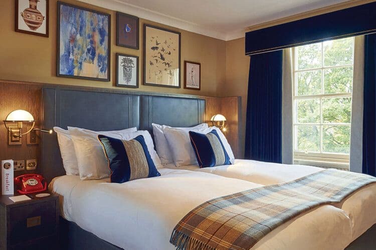 A hotel be with tartan spread in Scotland